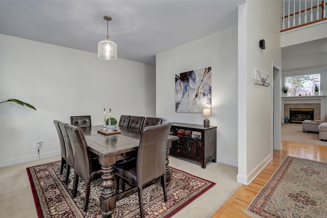 3931 E Stanford St, Springfield, MO 65809 - dining room featuring light wood-style floors and a tile fireplace