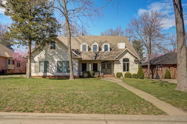 3931 E Stanford St, Springfield, MO 65809 - view of front of home featuring a front lawn, stone siding, a porch, and a shingled roof