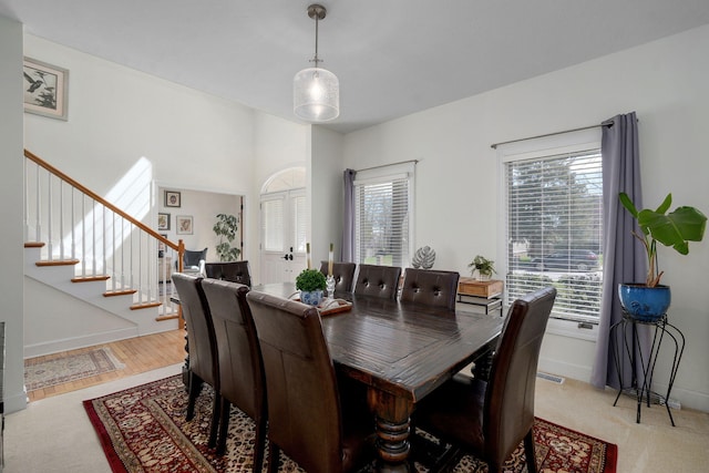 3931 E Stanford St, Springfield, MO 65809 - dining room with plenty of natural light, stairs, and light carpet