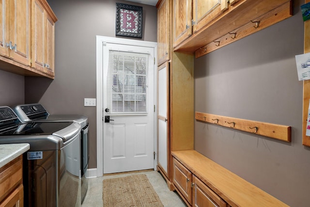 3931 E Stanford St, Springfield, MO 65809 - washroom featuring washer and clothes dryer and cabinet space