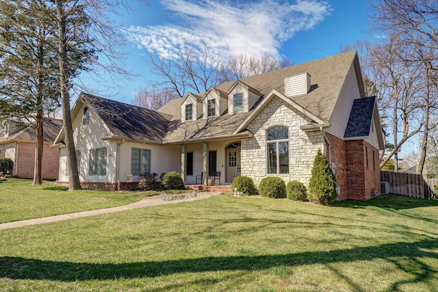 3931 E Stanford St, Springfield, MO 65809 - view of front of home featuring stone siding, a porch, and roof with shingles