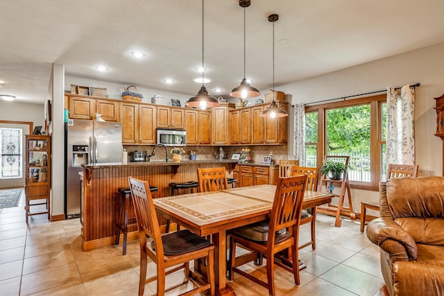 2419 W Deerbrooke Trl, Ozark, MO 65721 - dining space with light tile patterned floors and recessed lighting