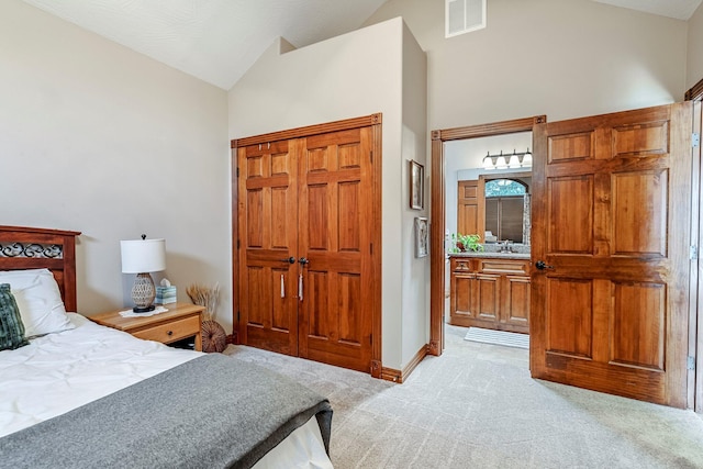 2419 W Deerbrooke Trl, Ozark, MO 65721 - bedroom with light colored carpet, a closet, high vaulted ceiling, and ensuite bathroom