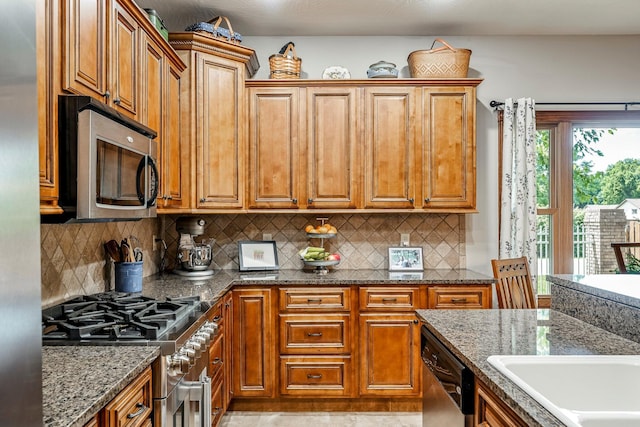 2419 W Deerbrooke Trl, Ozark, MO 65721 - kitchen featuring appliances with stainless steel finishes and brown cabinets