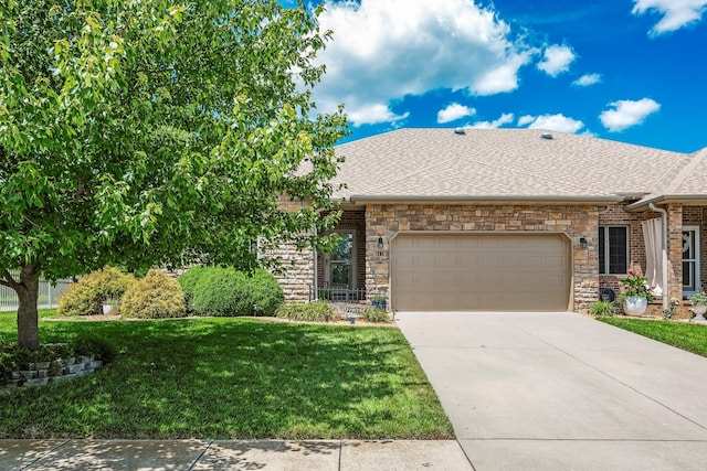 2419 W Deerbrooke Trl, Ozark, MO 65721 - view of front facade featuring a garage, concrete driveway, a front lawn, roof with shingles, and stone siding