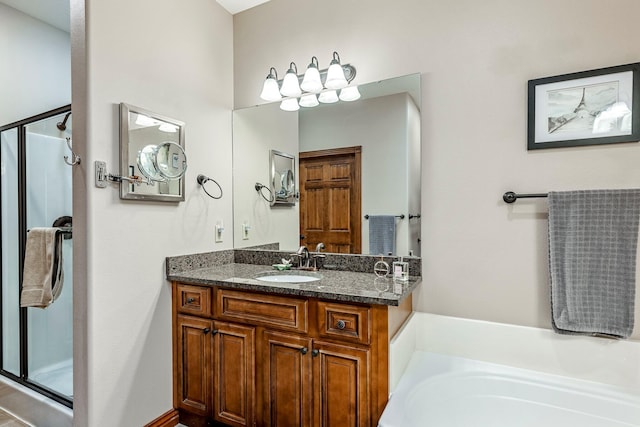2419 W Deerbrooke Trl, Ozark, MO 65721 - bathroom featuring vanity, a garden tub, and a shower stall