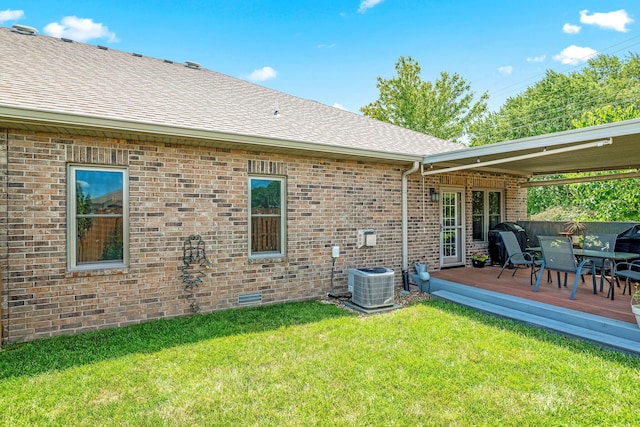 2419 W Deerbrooke Trl, Ozark, MO 65721 - rear view of property with a shingled roof, a deck, a yard, brick siding, and outdoor dining area