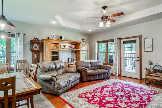 2419 W Deerbrooke Trl, Ozark, MO 65721 - living room with a ceiling fan, light wood-type flooring, recessed lighting, and a raised ceiling