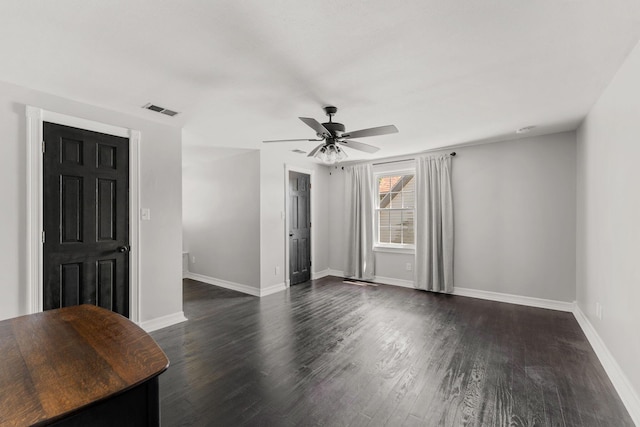 2311 S Golden Ave, Springfield, MO 65807 - unfurnished room featuring a ceiling fan and dark wood-style floors