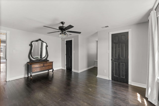 2311 S Golden Ave, Springfield, MO 65807 - unfurnished living room featuring a ceiling fan and wood finished floors