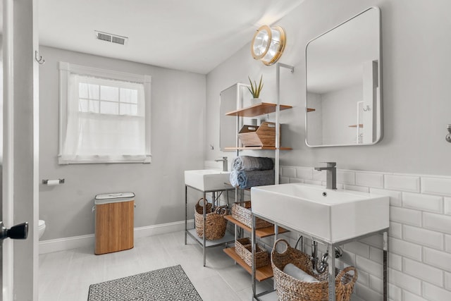 2311 S Golden Ave, Springfield, MO 65807 - bathroom with a sink and toilet