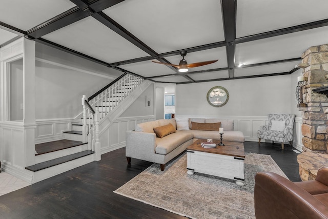 2311 S Golden Ave, Springfield, MO 65807 - living area with coffered ceiling, wood finished floors, ceiling fan, stairs, and a decorative wall