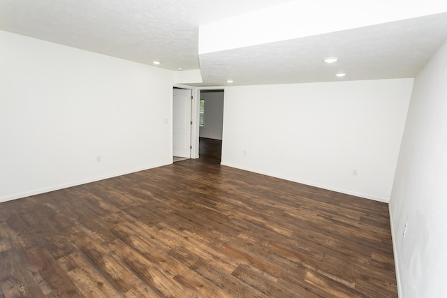 297 Kelsi Ln, Branson, MO 65616 - unfurnished room featuring dark wood-type flooring and recessed lighting