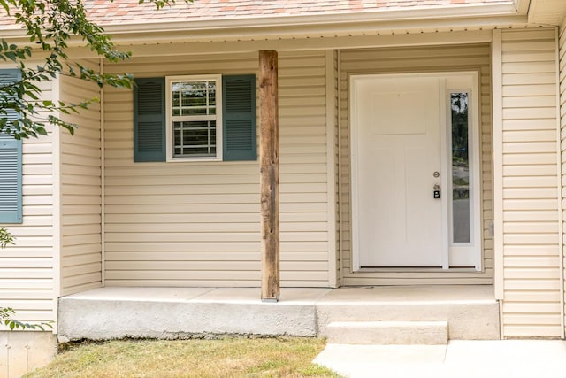297 Kelsi Ln, Branson, MO 65616 - property entrance with a shingled roof