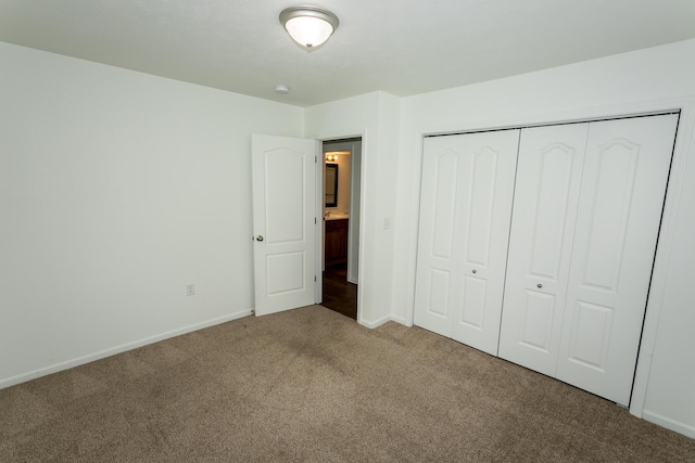 297 Kelsi Ln, Branson, MO 65616 - unfurnished bedroom featuring carpet floors and a closet