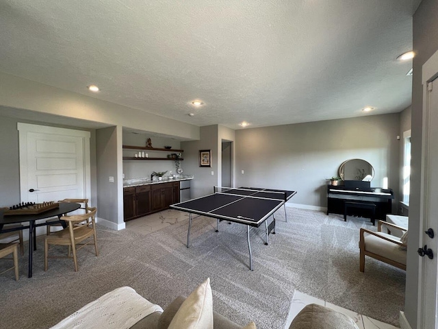 4212 Tuscany Cir, Ozark, MO 65721 - playroom featuring light colored carpet, a textured ceiling, recessed lighting, and bar area