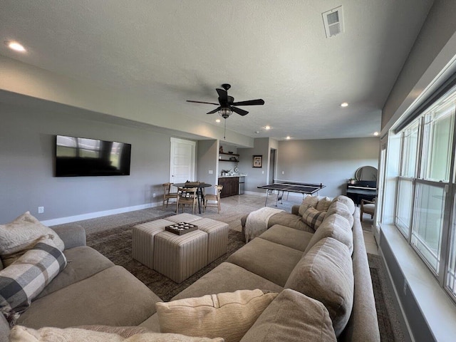 4212 Tuscany Cir, Ozark, MO 65721 - carpeted living room with recessed lighting, ceiling fan, and a textured ceiling