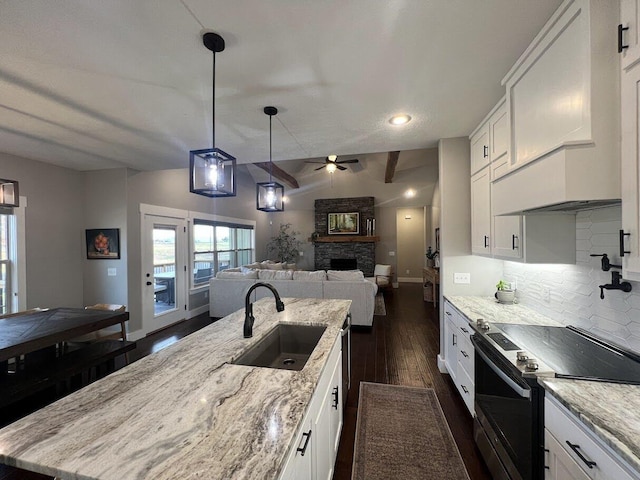 4212 Tuscany Cir, Ozark, MO 65721 - kitchen featuring electric range, dark wood-type flooring, ceiling fan, open floor plan, and backsplash