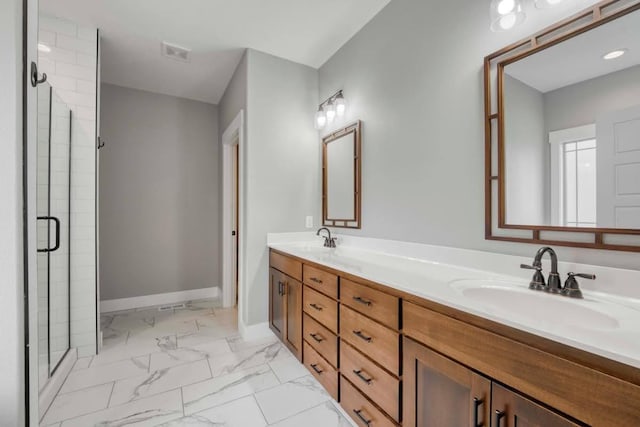 4212 Tuscany Cir, Ozark, MO 65721 - bathroom with marble look tile flooring, double vanity, and a stall shower