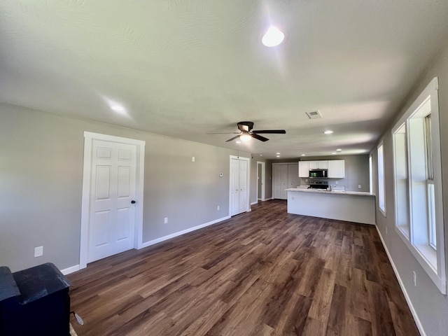 711 W Woodbine Rd, Ash Grove, MO 65604 - unfurnished living room featuring dark wood finished floors, recessed lighting, and a ceiling fan