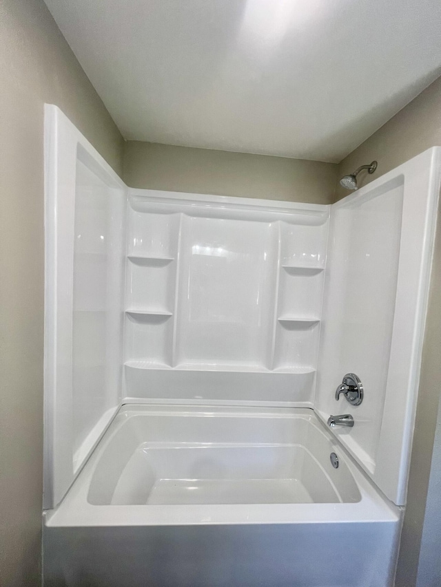 711 W Woodbine Rd, Ash Grove, MO 65604 - full bathroom featuring bathing tub / shower combination
