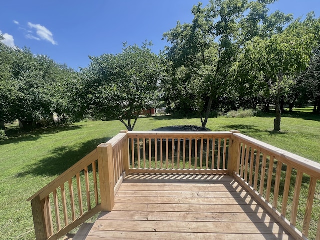 711 W Woodbine Rd, Ash Grove, MO 65604 - wooden deck featuring a lawn