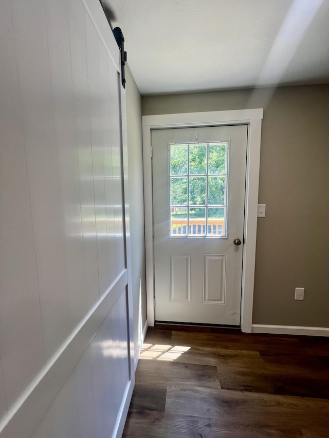 711 W Woodbine Rd, Ash Grove, MO 65604 - doorway to outside with wood finished floors and a barn door