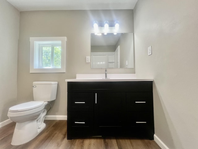 711 W Woodbine Rd, Ash Grove, MO 65604 - half bath with wood finished floors and vanity