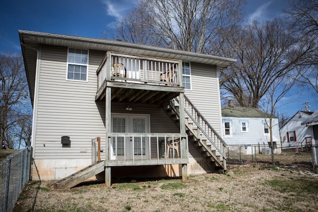602 E Robertson, Ozark, MO 65721 - rear view of property with stairs, a fenced backyard, and a deck
