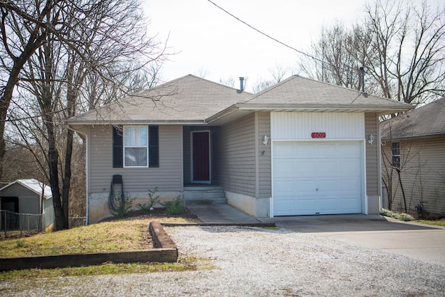 602 E Robertson, Ozark, MO 65721 - single story home featuring driveway, a garage, and a shingled roof