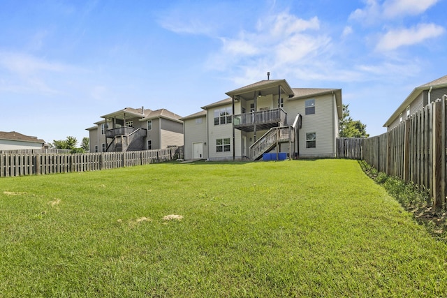 5323 S Carson St, Battlefield, MO 65619 - rear view of house featuring stairway and a fenced backyard
