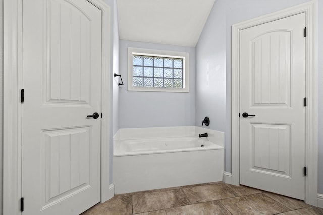 5323 S Carson St, Battlefield, MO 65619 - bathroom featuring a garden tub and baseboards