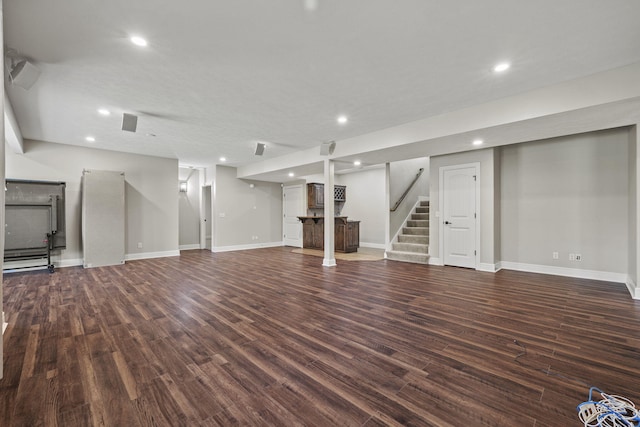 5323 S Carson St, Battlefield, MO 65619 - unfurnished living room featuring recessed lighting, stairs, and wood finished floors