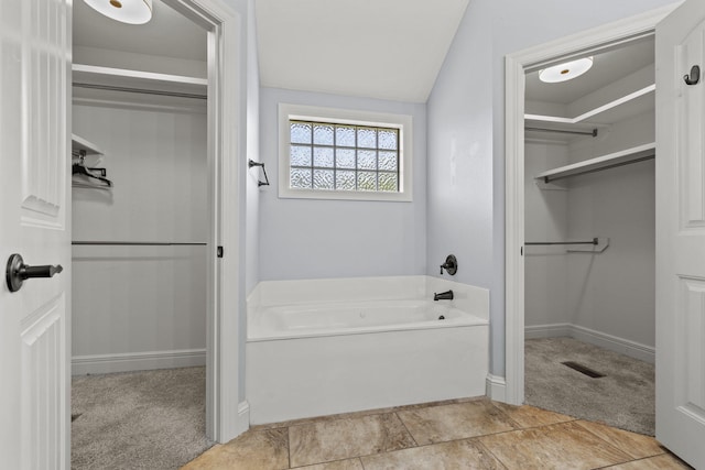 5323 S Carson St, Battlefield, MO 65619 - full bathroom with a garden tub and a spacious closet