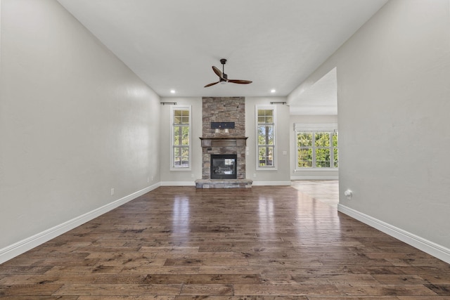 5323 S Carson St, Battlefield, MO 65619 - unfurnished living room featuring dark wood-style floors, a ceiling fan, a fireplace, and recessed lighting