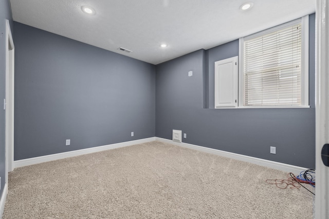 5323 S Carson St, Battlefield, MO 65619 - carpeted empty room with recessed lighting