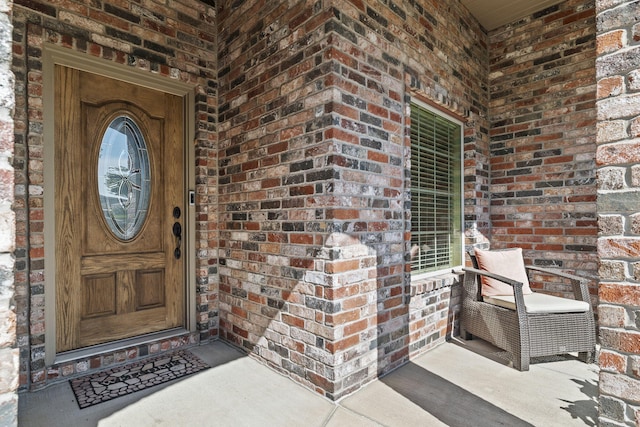 5323 S Carson St, Battlefield, MO 65619 - property entrance with brick siding and covered porch