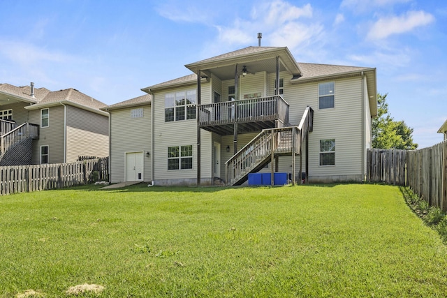 5323 S Carson St, Battlefield, MO 65619 - back of house with stairs, a deck, a fenced backyard, and a ceiling fan