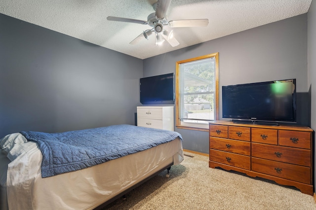 508 N Cherry Cir, Nixa, MO 65714 - bedroom featuring light carpet, a textured ceiling, and ceiling fan