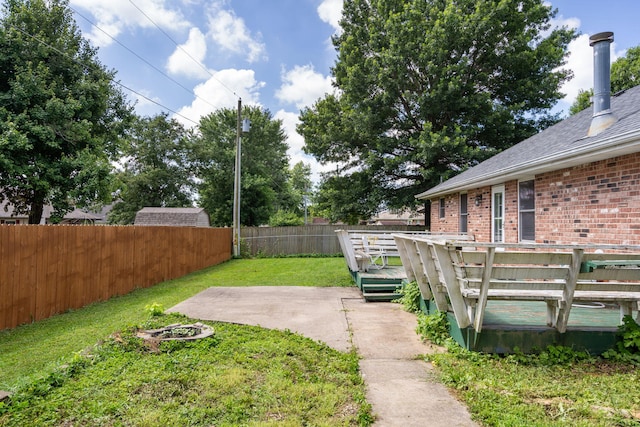 508 N Cherry Cir, Nixa, MO 65714 - fenced backyard with a patio