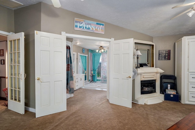 1343 Woodlawn Ave, Mount Vernon, MO 65712 - unfurnished bedroom with carpet, a textured ceiling, and a ceiling fan