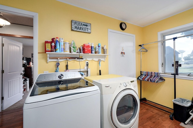 1343 Woodlawn Ave, Mount Vernon, MO 65712 - laundry area with washer and clothes dryer and wood finished floors