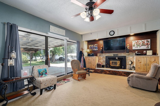 1343 Woodlawn Ave, Mount Vernon, MO 65712 - carpeted living room with ceiling fan, a textured ceiling, and a fireplace