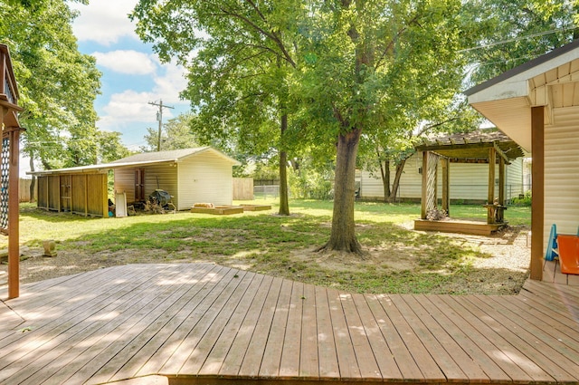 1343 Woodlawn Ave, Mount Vernon, MO 65712 - wooden terrace featuring a yard and an outdoor structure