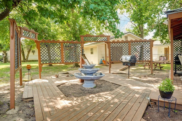 1343 Woodlawn Ave, Mount Vernon, MO 65712 - wooden deck with grilling area