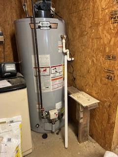 134 Meadowbrook Ln, Walnut Shade, MO 65771 - utility room featuring gas water heater