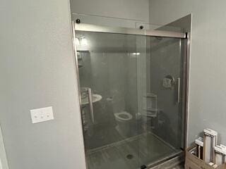 134 Meadowbrook Ln, Walnut Shade, MO 65771 - bathroom with a stall shower and toilet