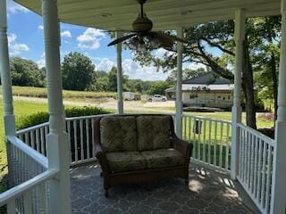 134 Meadowbrook Ln, Walnut Shade, MO 65771 - sunroom / solarium featuring an outdoor hangout area and ceiling fan