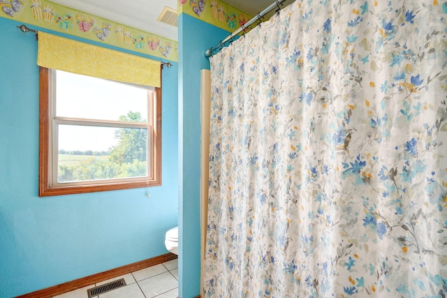 8404 Fossilsaurus Ln, Ash Grove, MO 65604 - bathroom featuring tile patterned flooring and curtained shower