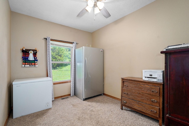 8404 Fossilsaurus Ln, Ash Grove, MO 65604 - bedroom with freestanding refrigerator, fridge, light carpet, and ceiling fan